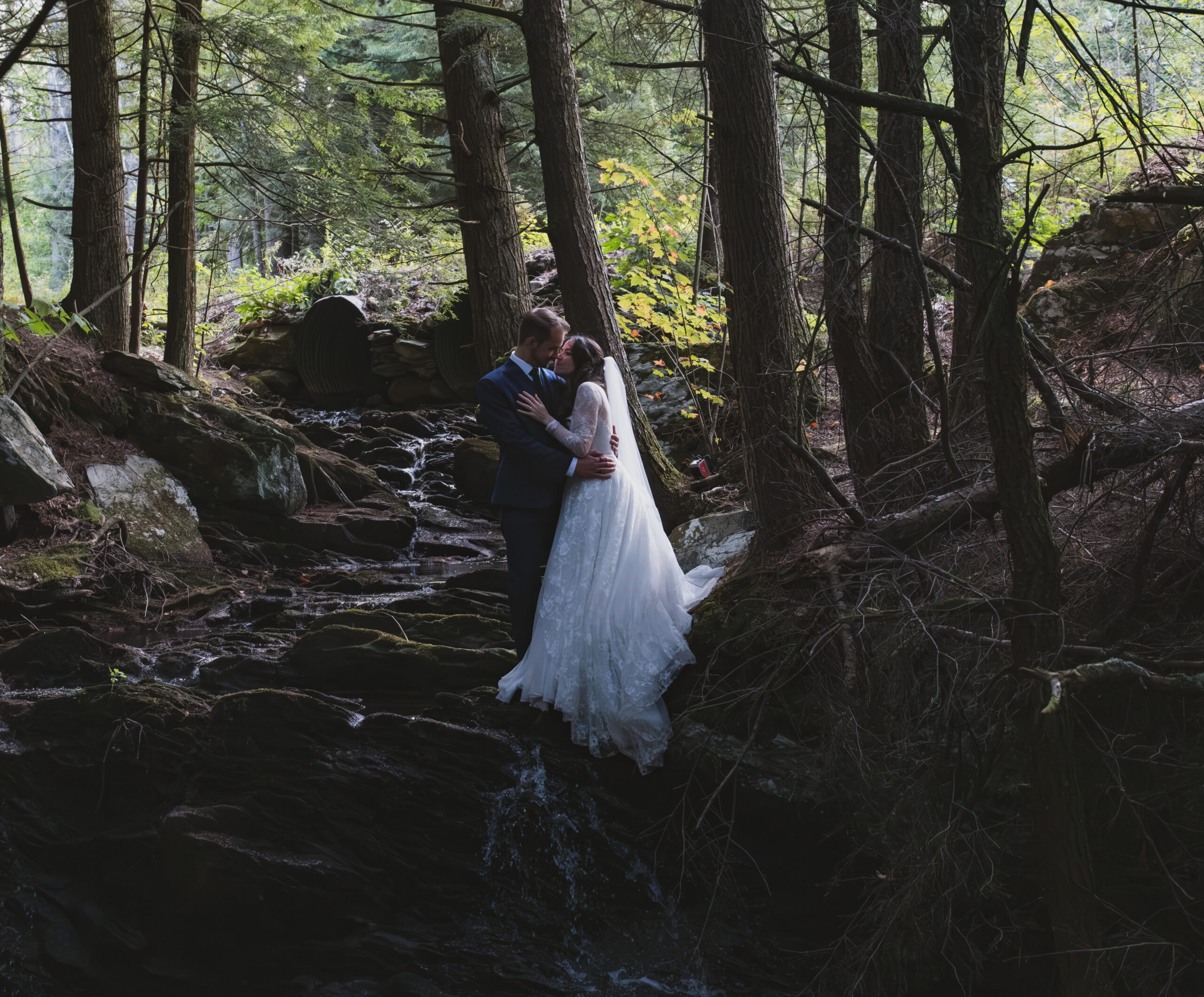 Couple eloping in the woods in New Hampshire