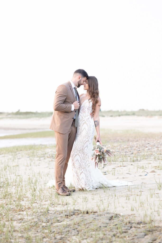 dreamy bride and groom portrait at the beach