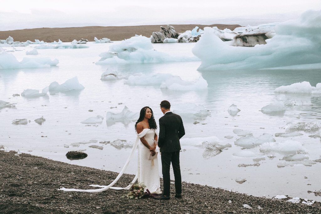 iceland elopement ceremony by a icy lagoon