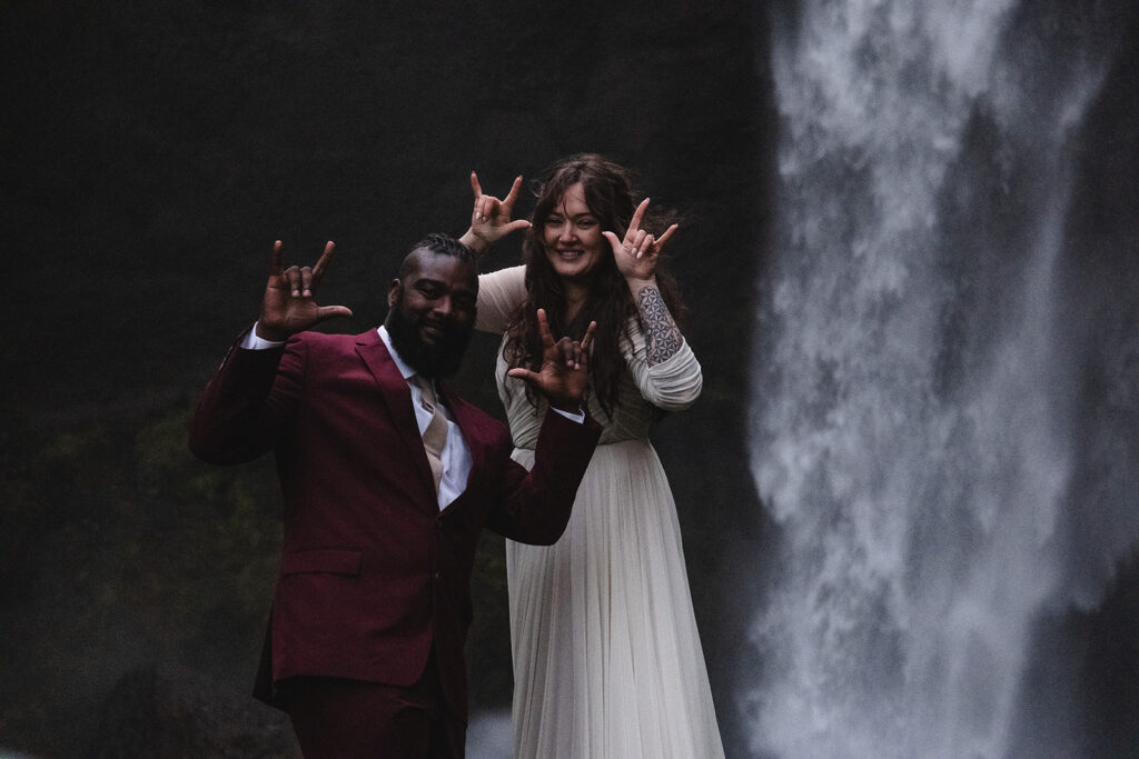 fun adventure elopement with waterfall backdrops