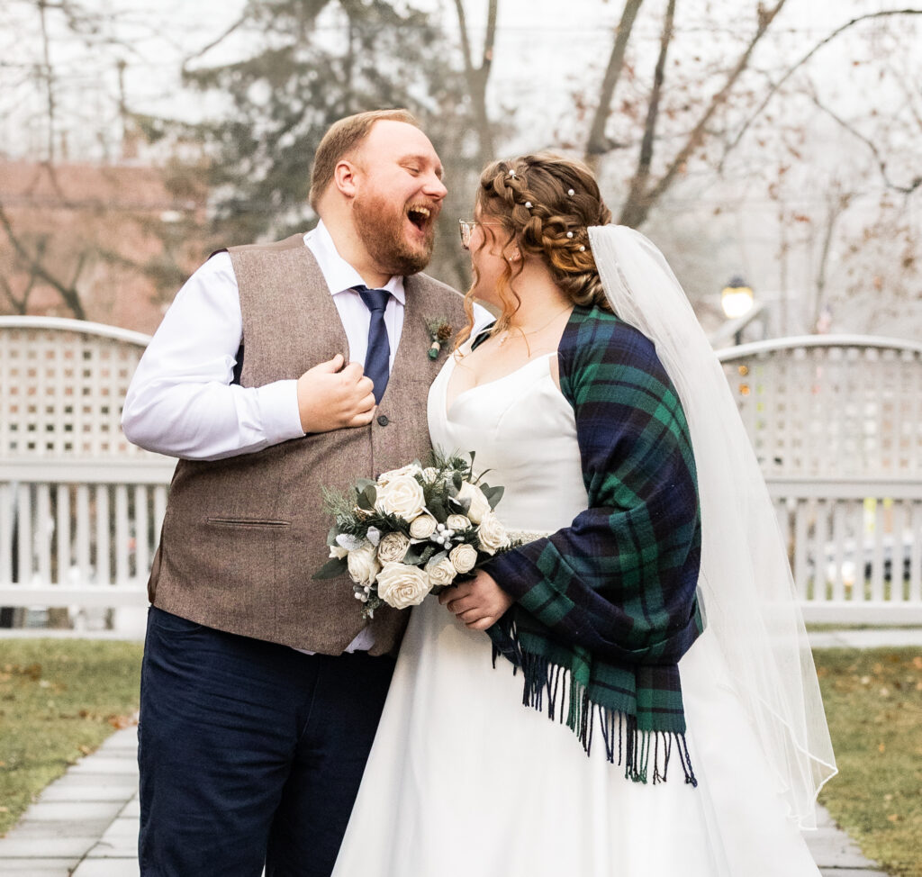 candid joyful elopement couple at their vermont elopement location