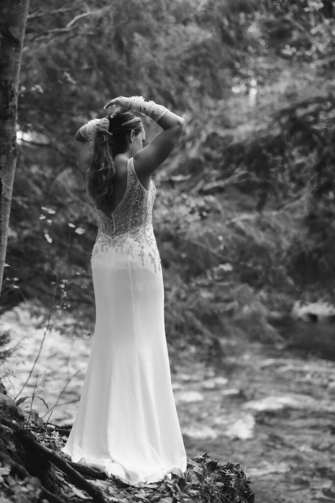 candid black and white bridal portrait in the forest