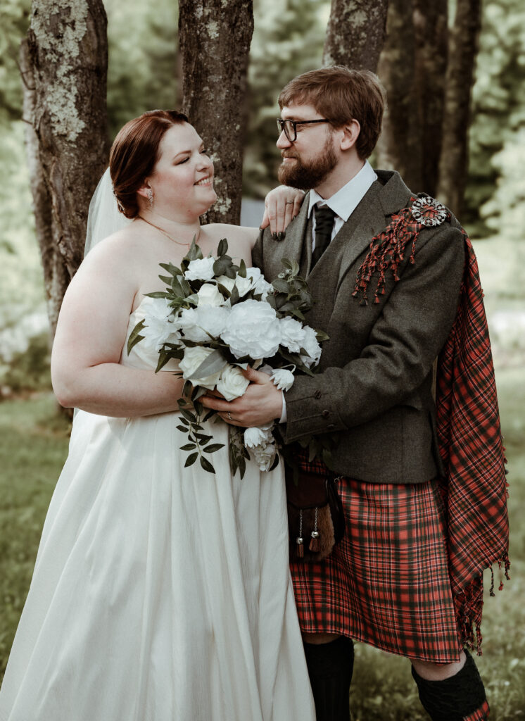 candid joyful elopement couple at their vermont elopement location