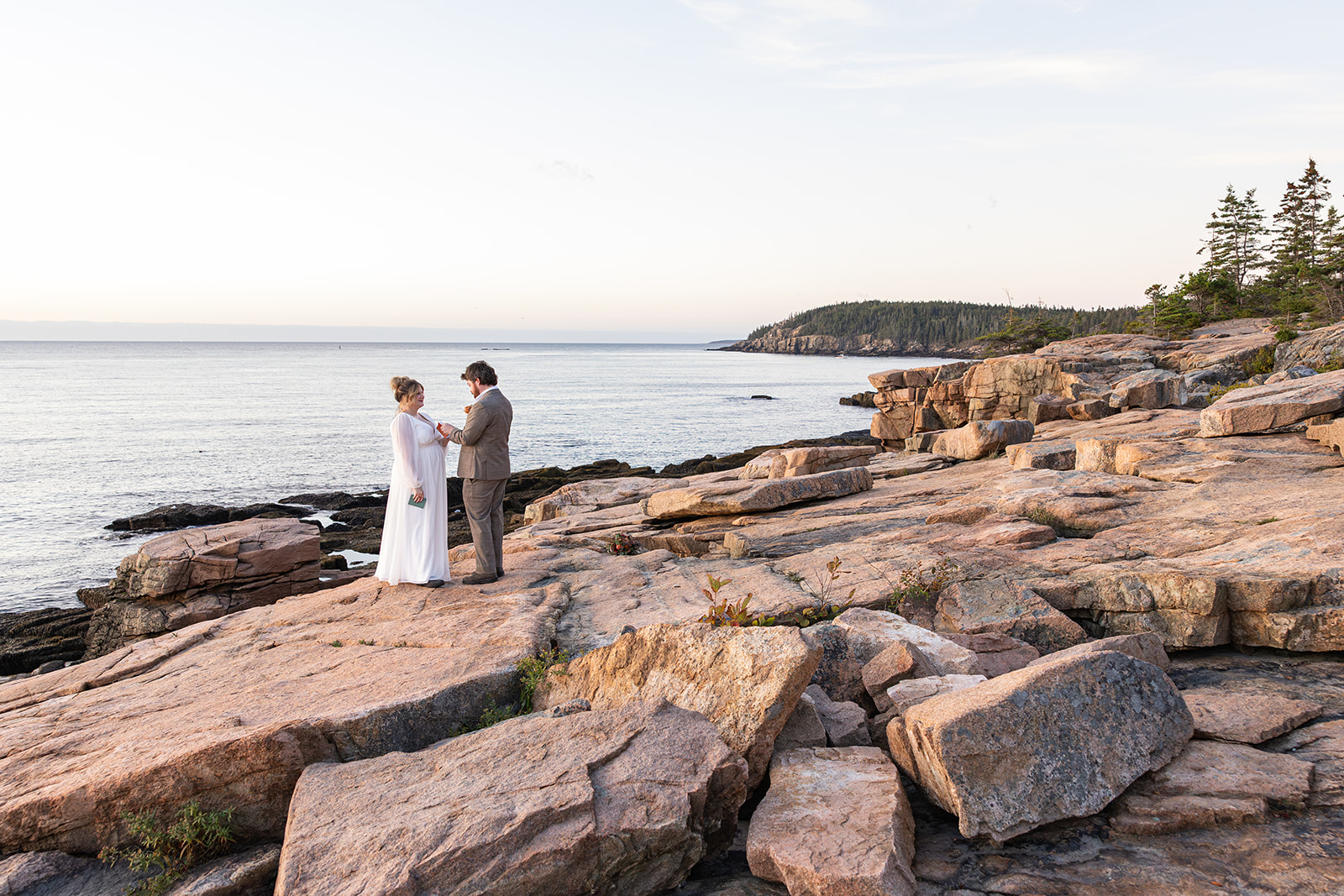 couple eloping in Acadia National Park during sunrise